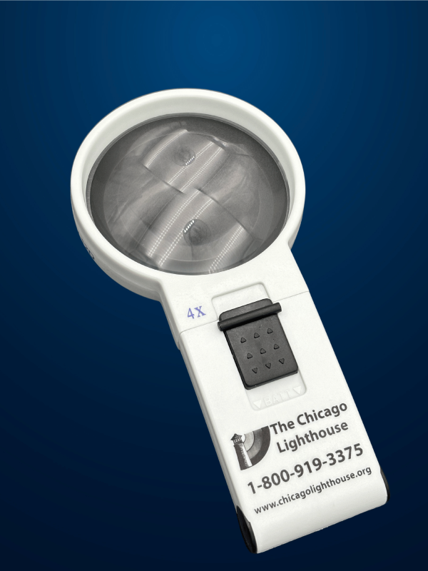 4X Round illuminated Hand-Held magnifier in white with black switch and Chicago lighthouse logo