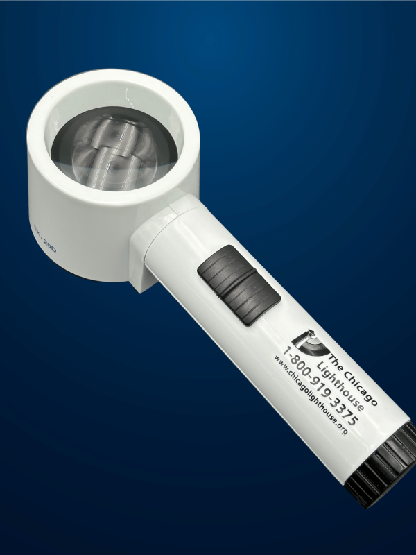 6X Round illuminated Stand magnifier in white with black switch and Chicago lighthouse logo