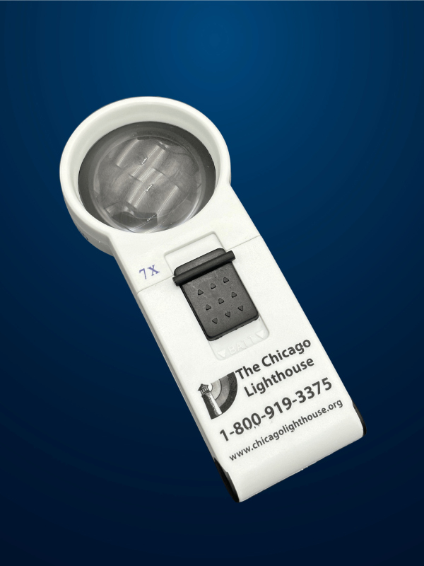 7X Round illuminated Hand-Held magnifier in white with black switch and Chicago lighthouse logo