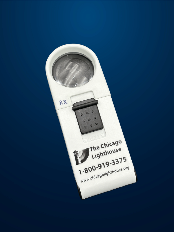 8X Round illuminated Hand-Held magnifier in white with black switch and Chicago lighthouse logo