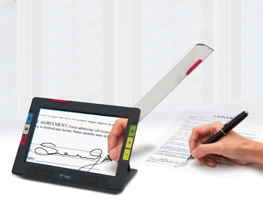 A person using the side camera of the Ruby 10 by magnifying on them signing a sheet of paper.
