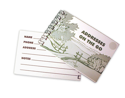 A small 6 x 4 inch spiral bound booklet with bold lines can carry 40 of your most important addresses in purse or pocket.  Large spaces make it easier to use and read.