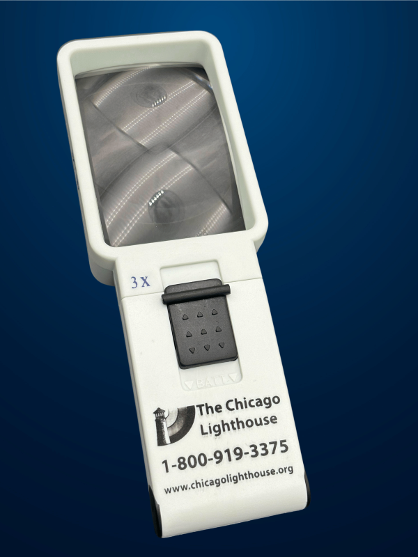 3X Square illuminated handheld magnifier in white with black switch and Chicago lighthouse logo