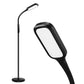 Reading floor lamp by Lastar features a sturdy circular base and controls bar near the top