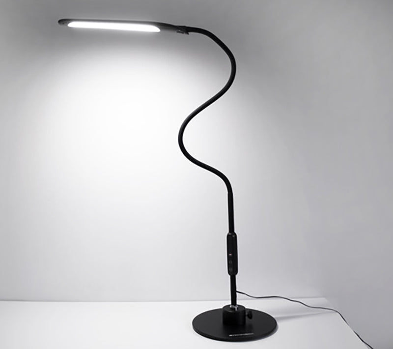 The Magno Lumina Max Desk Lamp shown with it's light on, is ideal for those with low vision because it allows users to select the optimal light color temperature and brightness level settings to maximize their viewing environment. This corded lamp is available in a desktop and floor version and provides superior illumination.  It's black flexible neck and weighted base makes it ideal for users with low vision.