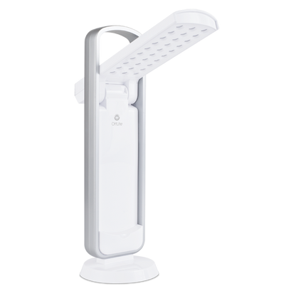 Task lamp in all white with silver handle above. LED lights are visible on the open arm with the Ottlite logo visible. in the center