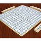 Deluxe Low Vision scrabble board with an ongoing game. Words on the board spell Mirror, Magnifiers, Low, Vision, Telephone. On a Letter holder o the side the letters spell scrabble