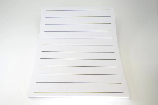 White paper with bold black lines on both sides of the 8.5 x 11 inch sheets. Lines are .87 inches apart. 100 sheets to a pad. 12 lines per page. Great for those who are low vision or visually impaired.