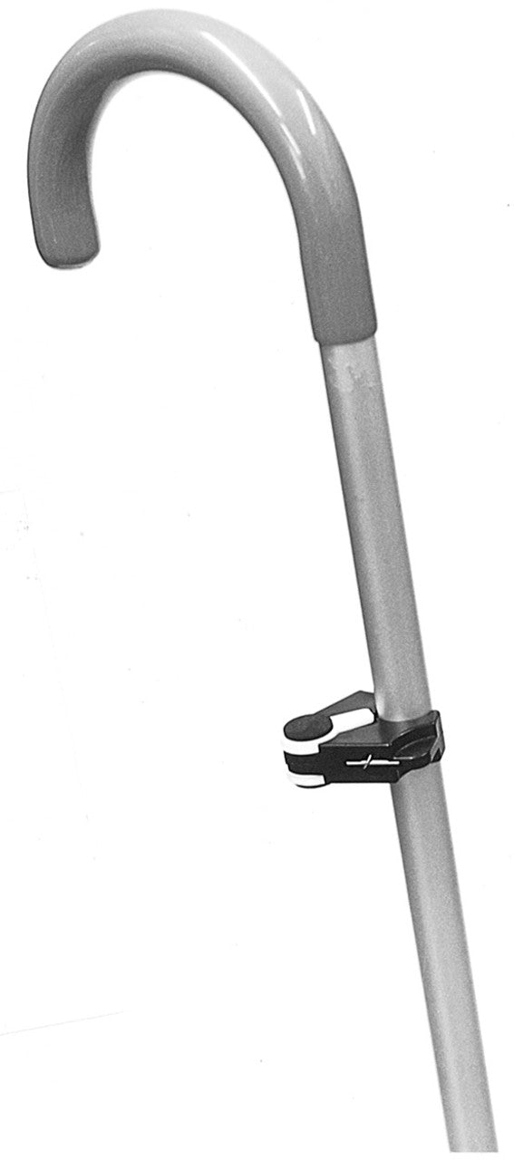 Clip On Cane Holder allows a cane to be supported on any table or desk. Foam disk on either side creates enough friction to hold cane in place.