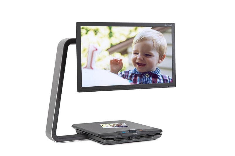 ClearView C with Speech Color CCTV displaying an enlarged photo of a child on it's screen and a small photo on the tray of the ClearView C.