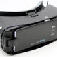 IrisVision Live electronic glasses in a black color with fully adjustable straps for hands-free use. The front of the device has a camera that delivers a 70-degree, extra-wide immersive field of view.