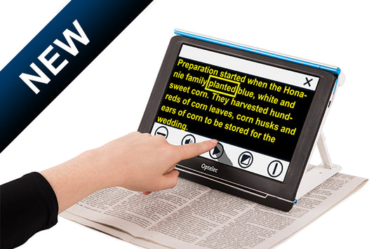 The Optelec Compact 10 HD With Speech magnifies newspapers, letters, and magazines for viewing text, pictures, and other details. Its purposely designed swing-out arm opens a whole new range of possibilities. It allows the Compact 10 HD Speech to capture full-page documents and then read them to you with one press on the touchscreen. A front facing view of the Compact 10 revealing a hand reaching out and adjusting the touch screen font changing the color to yellow and it's background to black.