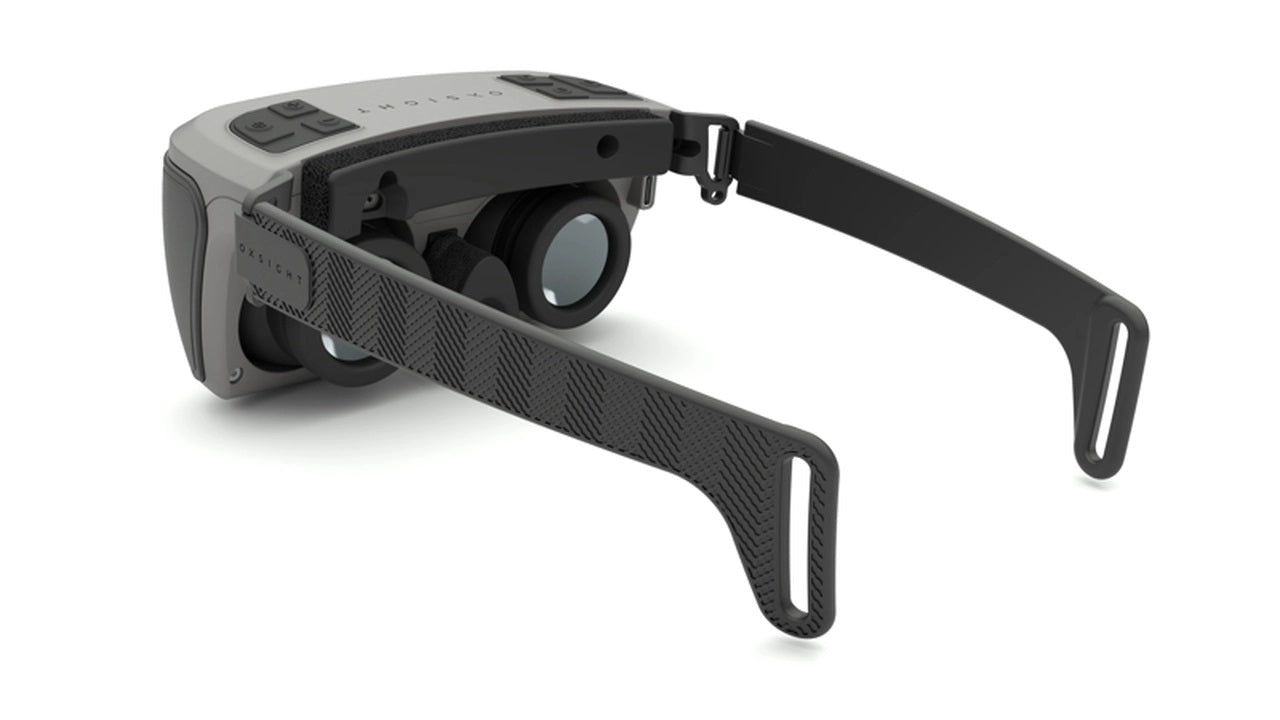Side to back facing view of the OxSight Onyx Smart Glasses with it's arms extended.