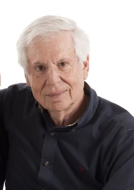 Chicago Eternal Author Larry Brautman wearing a black button up shirt.